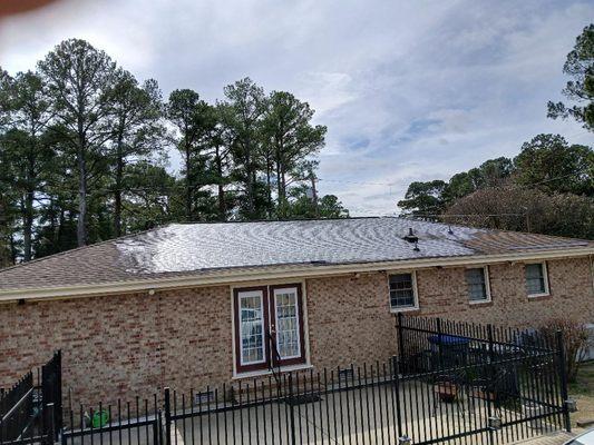 Farm Bureau is saying the small pipe that is the lowest on the roof right above the window is causing leaks in the dark area.