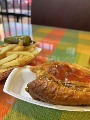 Table and my delicious hotdog and fries.