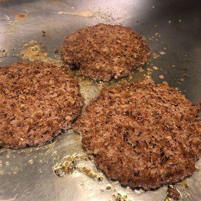 Cooking up our Impossible Burgers on their own separate grill, Meat from Plants.