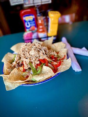 That's a salad!
Southwest Salad - grilled peppers & onions, fiesta mix, tortilla's & southwest chicken over crisp lettuce.