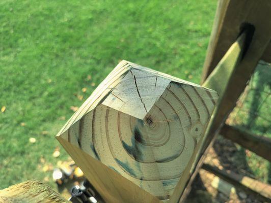 A trimmed split rail post.