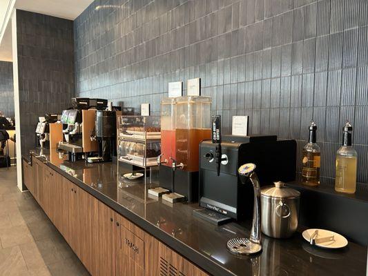 Self served coffee, tea, juice, and water
