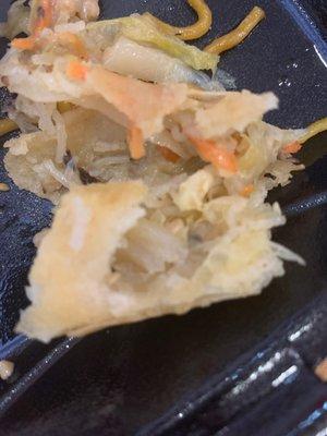 The inside of what looks like my aunts Coochie but it's a spring roll