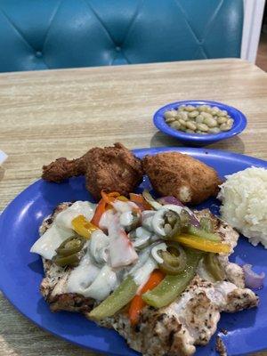 Walkers Sidekick their version of a smothered chicken, with hush puppies, mashed potatoes and Lima beans