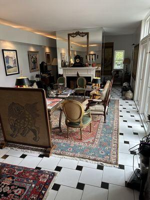 Living room with Tabriz carpet in place