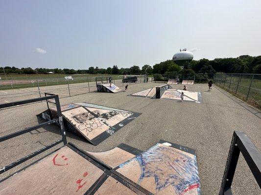 At the Romeo/Bruce/Washington Skate Park today with 7 kids. Using bikes, scooters and skateboards!