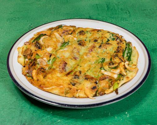 Seafood pancake with our house sauce