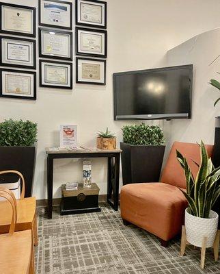 Waiting room and doctors credentials.