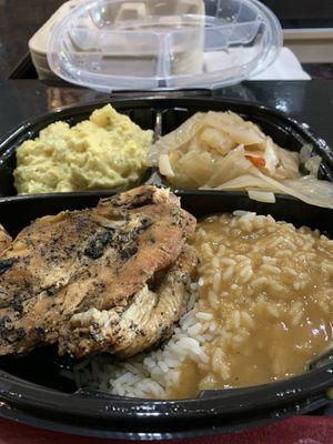 Chicken, rice and gravy, potato salad, cabbage