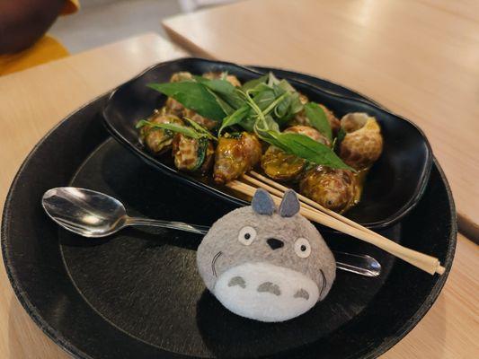 Sweet snails with salted egg sauce