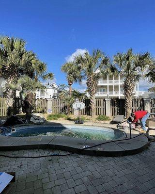 The repair crew techs are working very hard to get a customers pool back up and running leak free. Replacing a Hayward skimmer and return.