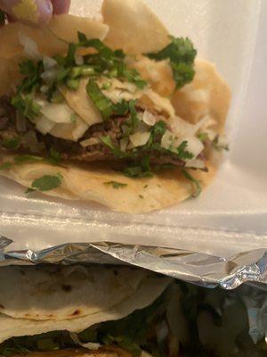 Barbacoa and pastor tacos