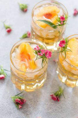 Georgia Peach Smash - Whiskey, lemon juice, simple syrup, tonic, peach