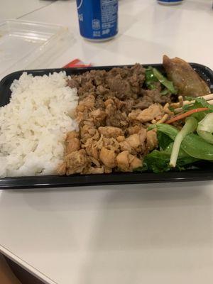 Honey glazed chicken and beef bowl with dumplings.