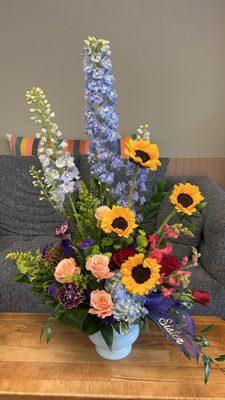 Artistic tribute floral arrangement.