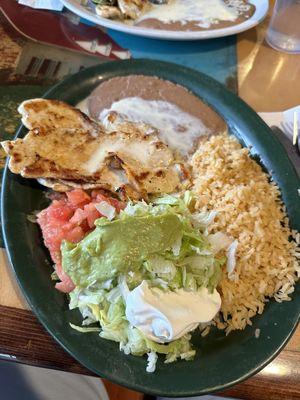 Pollo Loco comes with a guacamole salad, rice, beans, chicken and your tortillas of choice.