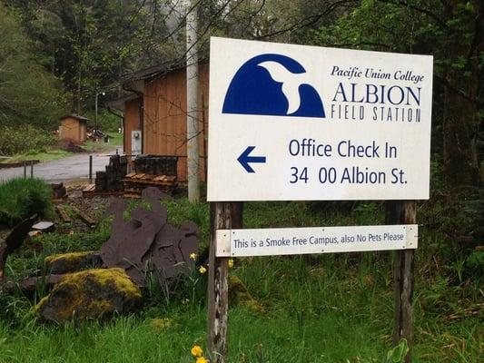 Entrance sign down the long driveway.