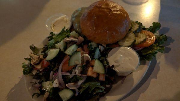 Burger and side salad