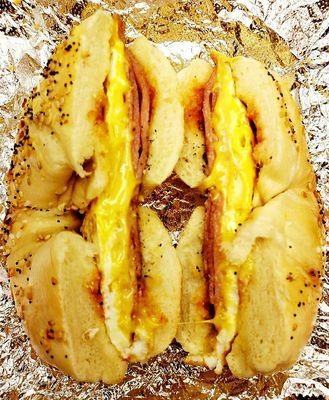 Shake Hands with Taylor Ham, Egg and Cheese on an Everything Bagel