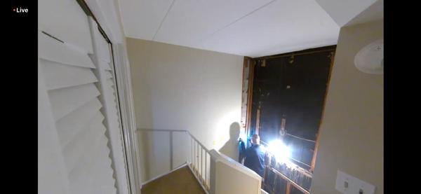 A third party company, KEM, immediately identifies visible black mold on the left wall- refuting Mark Minor's repeated denial of mold.