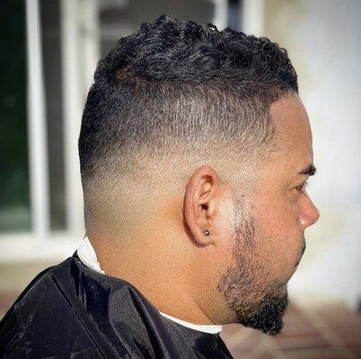 Mid Fade, line up, and beard trimmed.