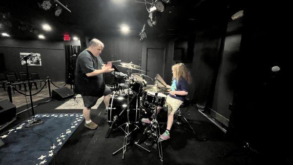 Dan teaching Drums