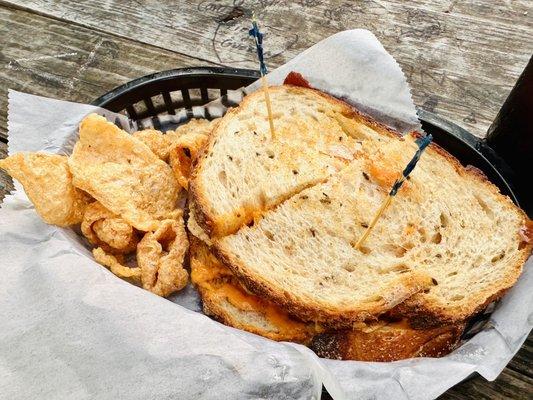 Reuben sandwich, pork rinds