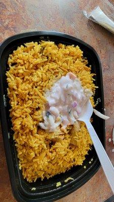 Biryani with yogurt sauce