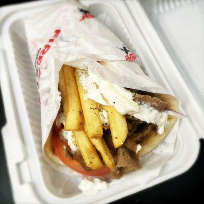 Beef-lamb gyro (w/ tomato, red onions, fries, and tzatziki sauce)