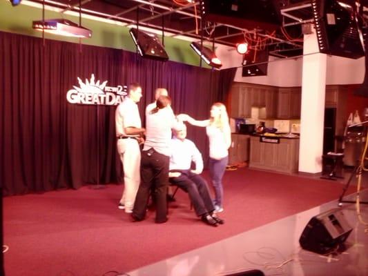 ALC gang preparing the "Levitating Lou" moment on the Great Day Show.