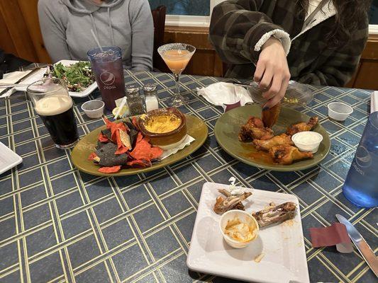 Wings Buffalo chicken dip nachos Arugula and beet salad.