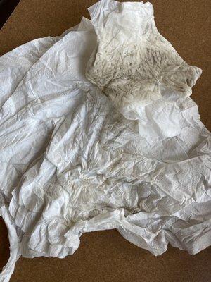 This is from wiping our table with napkins before we sat down.