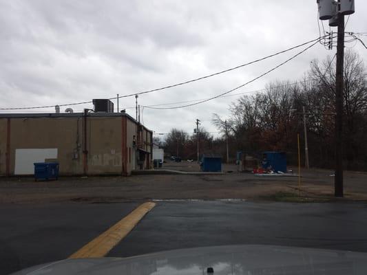 Your view of trash overflowing and gives you a great scenery while you wait on your medication!! Gosh!!
