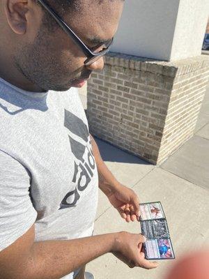 Our buddy with his lucky Planeswalkers!