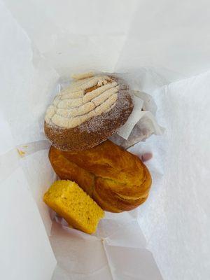 Concha, croissant looking like bread and cornbread (bread pudding is hiding underneath)