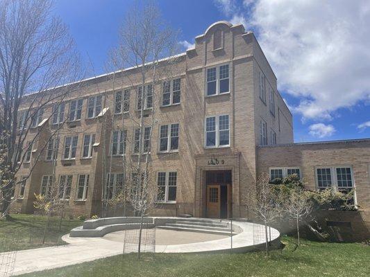 East entrance . Private studio on ground floor.