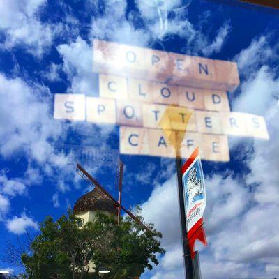 Cloudspotter's Cafe is located at 435 Alisal Rd, just across the street from the windmill.