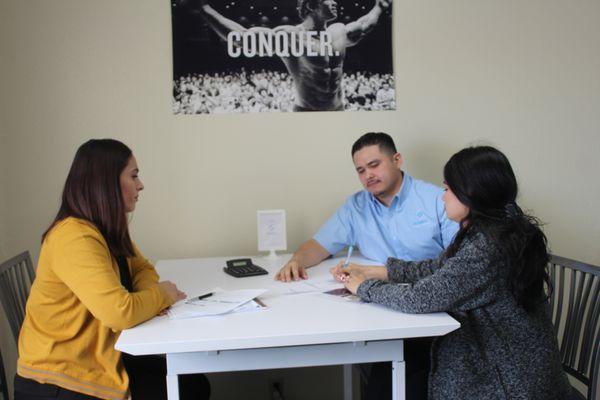 Synergy Capital Funding team meeting with a business owner interested in obtaining working capital.