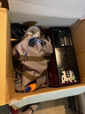 computers packed upside down with chopped wood and sunscreen