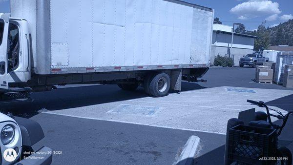 Central Oregon Appliance blocking handing capped parking,