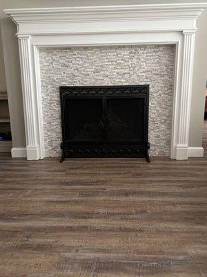 New flooring and tile around the fireplace.  Gave me the exact look I was going for!