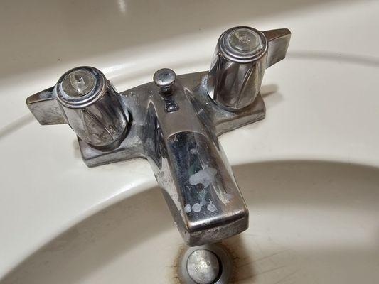 The sink still had toothpaste spit all over it from previous guest