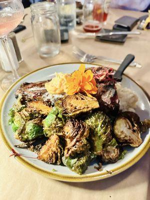 T-bone steak w crispy Brussels and smashed potatoes.
