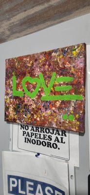Bathroom art at El Sabor de la Esquina