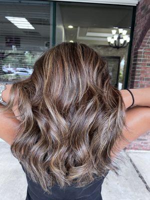 Soft brown Haircolor with mocha highlights--an elegant way to blend grays while adding natural, effortless dimension.