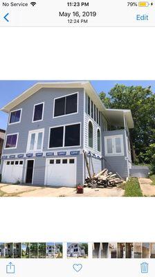 Painting and installation of windows completed at Livingston lakehouse. Demo and rebuild of wrap around deck in progress.