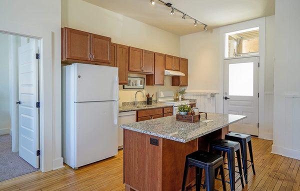 Kitchen with Island at Upper Post Flats in Fort Snelling, MN