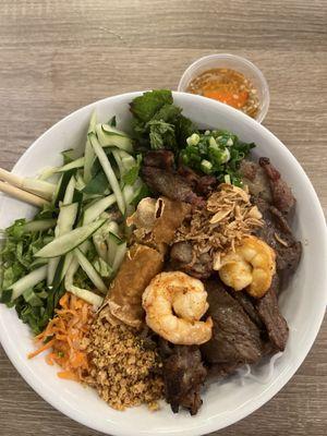 This was good. Vermicelli noodle bowl with grilled beef, shrimp, and cha gio, and herbs with nuoc mum.