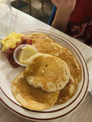 Kids plate had six big pancakes with bacon!