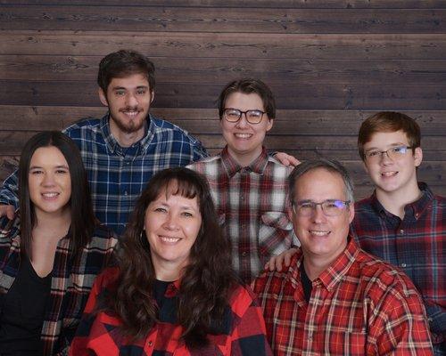 Doctor and his family. Visit our web page at www.EYESONHALL.com.